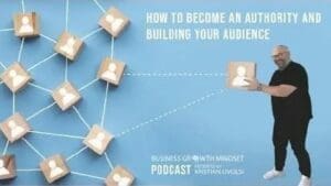 Kristian Livolsi on the Business Growth Mindset Podcast holding a block to represent building a personal brand and audience.