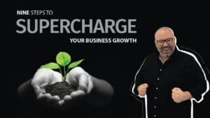 Kristian Livolsi on the Business Growth Mindset Podcast presenting nine steps to supercharge your business growth alongside an image of hands nurturing a seedling.